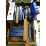 A tray of various stamp albums with firs