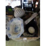 A box containing blue and white tureens,