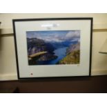 A framed and glazed photographic print o