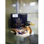 A Royal Crown Derby paperweight in the f
