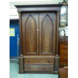 A 19th century mahogany linen press, the