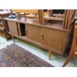 A mid 20th century laminated sideboard w