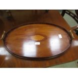 An Edwardian mahogany and inlaid oval br