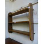 A set of oak wall shelves