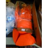 An orange buoyancy aid