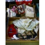 Two trays of eastern fabrics