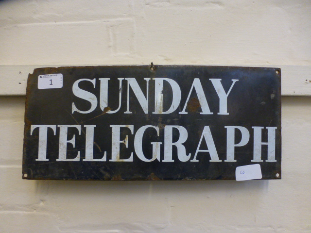 An enamelled Sunday Telegraph sign