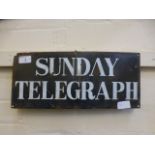 An enamelled Sunday Telegraph sign