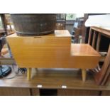 A mid 20th century teak sewing box with