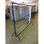A black metal framed clothes rail