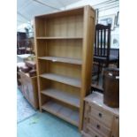 A modern full hight oak open bookcase