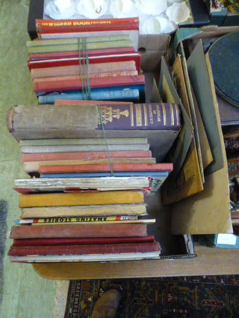 A tray containing children's annuals etc