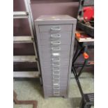 A 15 drawer metal stationary cabinet