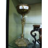 An Arts and Crafts style brass stand wit