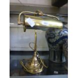 A brass desk lamp