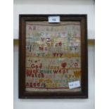 An oak framed and glazed sampler, dated