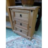 An Indonesian pine chest of three drawer