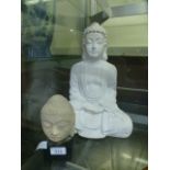 A moulded plaster bust of Buddha togethe
