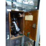 A cased microscope