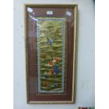 A framed and glazed oriental needlework