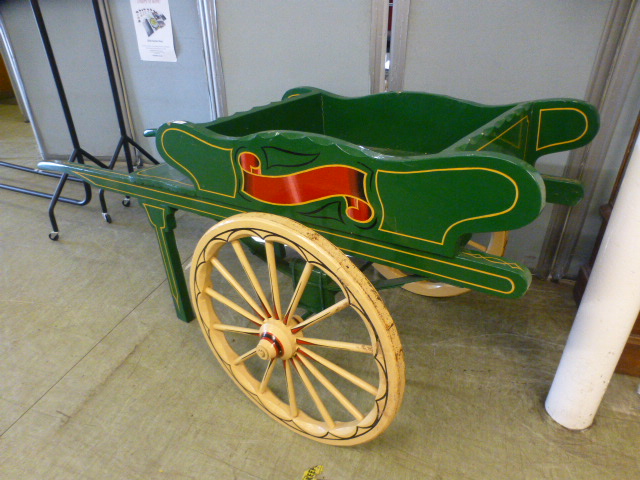 A green painted market barrow