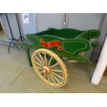 A green painted market barrow