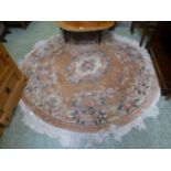 A circular brown ground Chinese rug