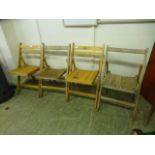 Four folding chairs