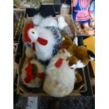 A tray containing soft toys to include c