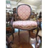 A mahogany framed open arm chair