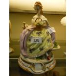 A continental ceramic model of lady with