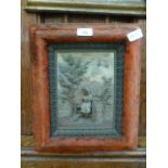 A felt framed ceramic relief panel of a