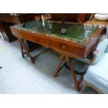 A reproduction yew campaign style desk