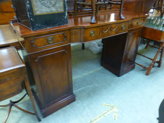 A reproduction mahogany twin pedestal si