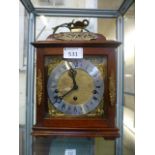 A mahogany mantle clock