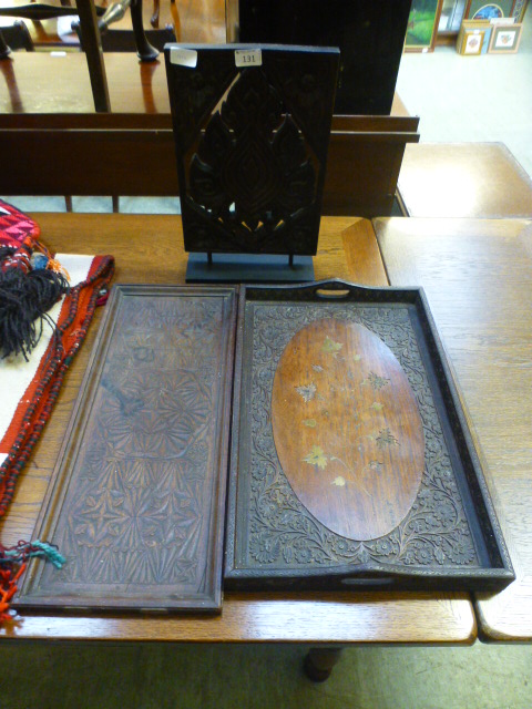 Two eastern carved trays along with a ca