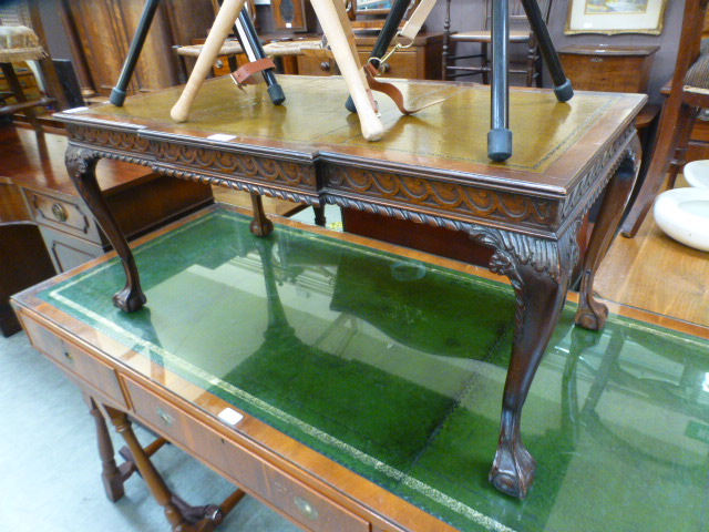 A reproduction mahogany coffee table, th