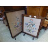 Two oak fire screens with needlework pan
