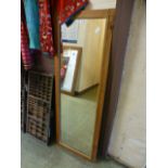 A pine framed rectangular mirror
