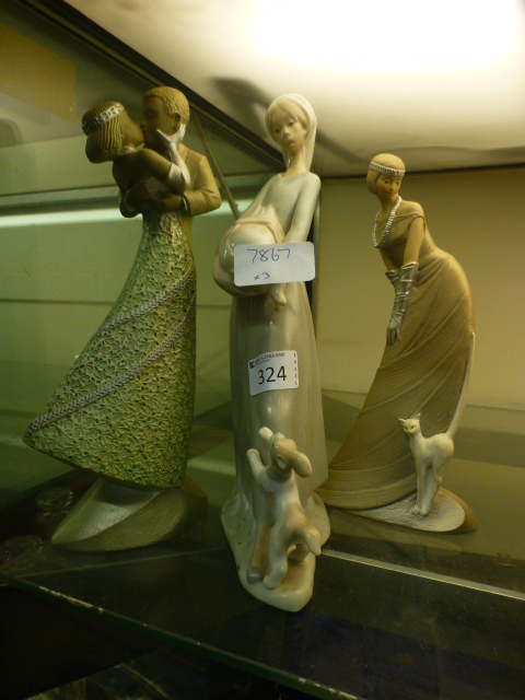 A Nao figurine of young lady with dog ho