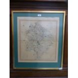 A framed and glazed map of Warwickshire