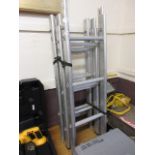 An extending aluminium ladder