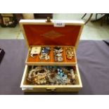 A jewellery box containing an assortment