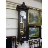 A reproduction mahogany drop dial wall c