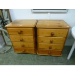 A pair of modern pine four drawer chests