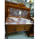 An Edwardian satinwood wash stand with m