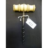 A bone handled cork screw