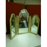 A triple vanity mirror