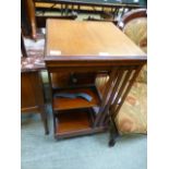 An Edwardian mahogany revolving bookcase