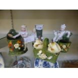 Four continental green ceramic figurines